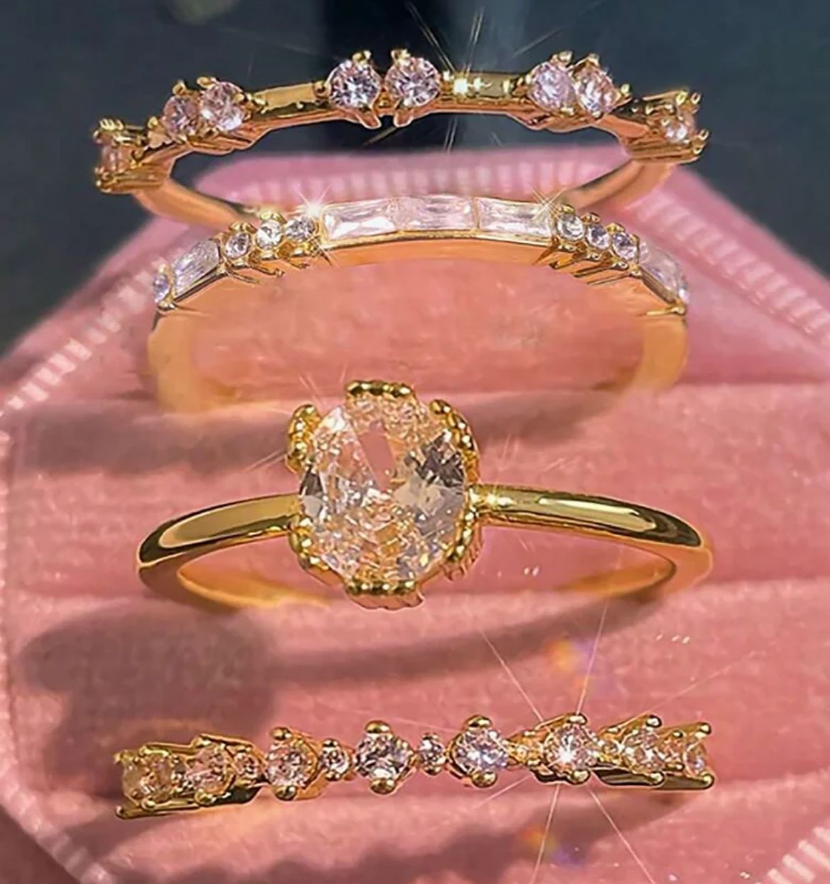 Golden with diamond set of rings